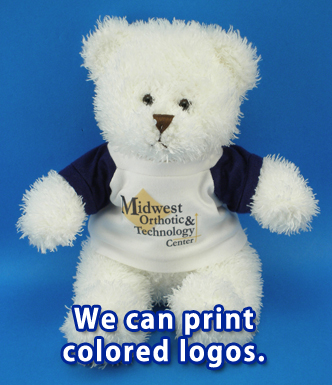 Teddy bear with multi-color logo shirt.